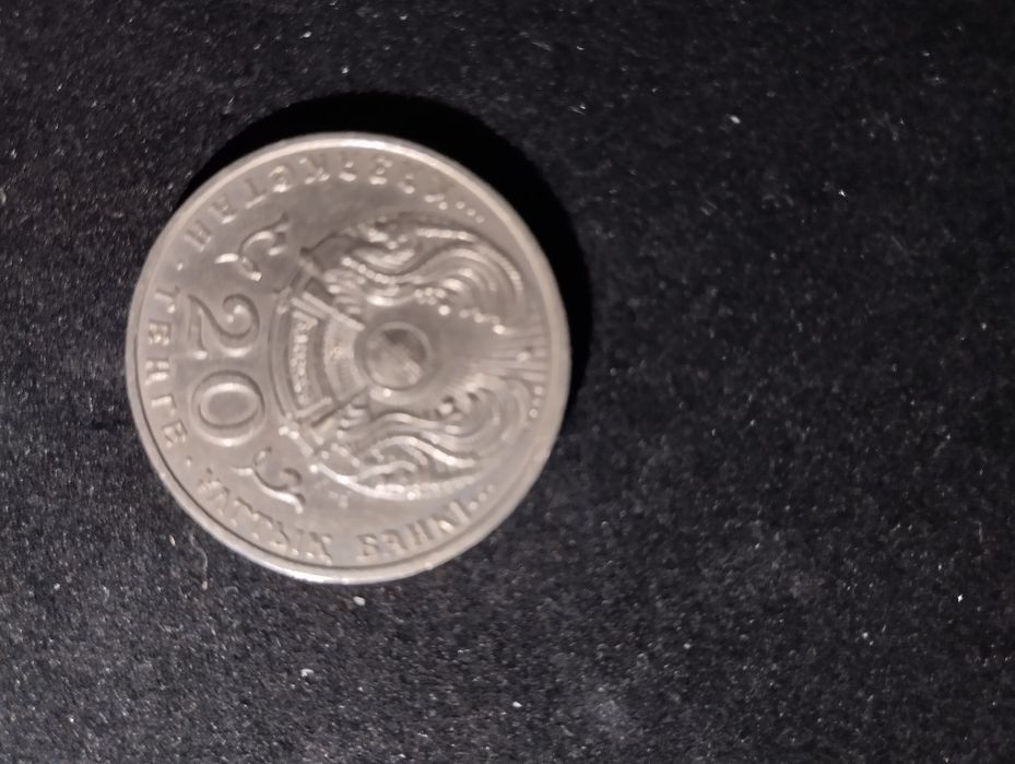 Монета с Мухтаром Ауэзовым