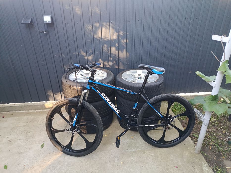 Bicicletă caraiman aproape nouă