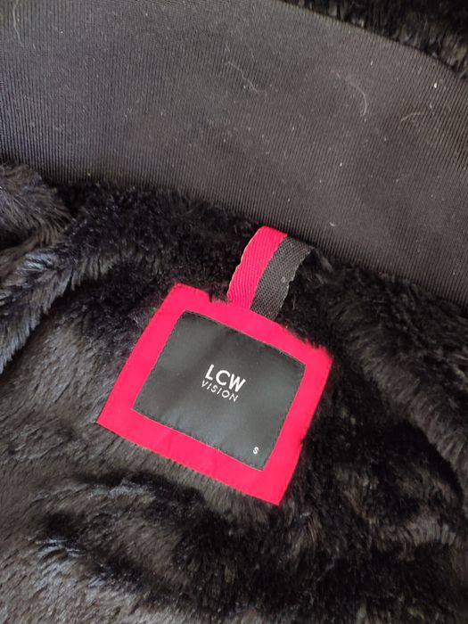 Продам зимний пуховик