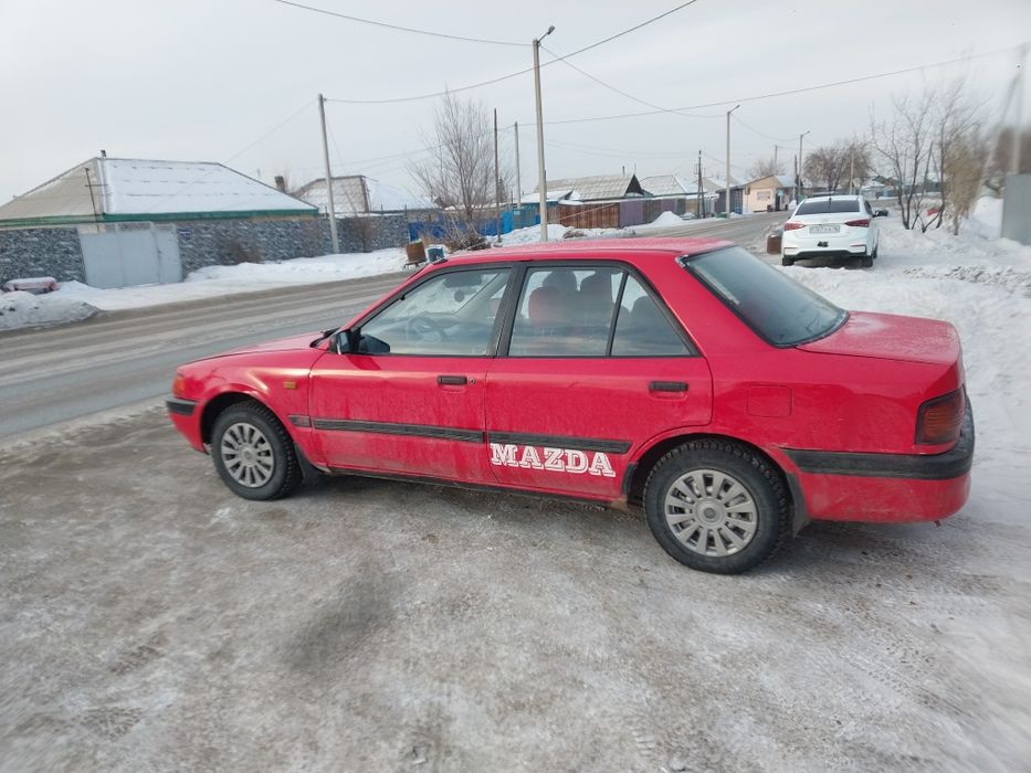 Мазда 323 на ходу