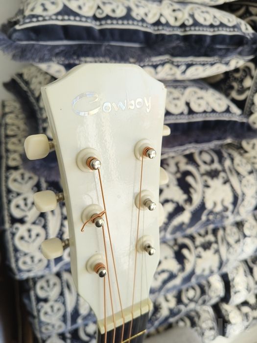 Gitara oq 200.000