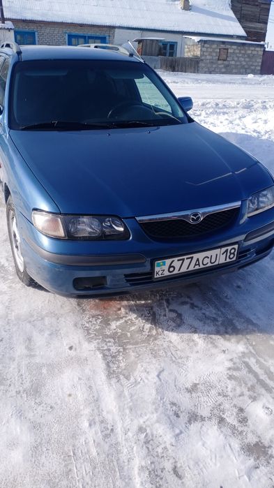 Мазда 626 птичка