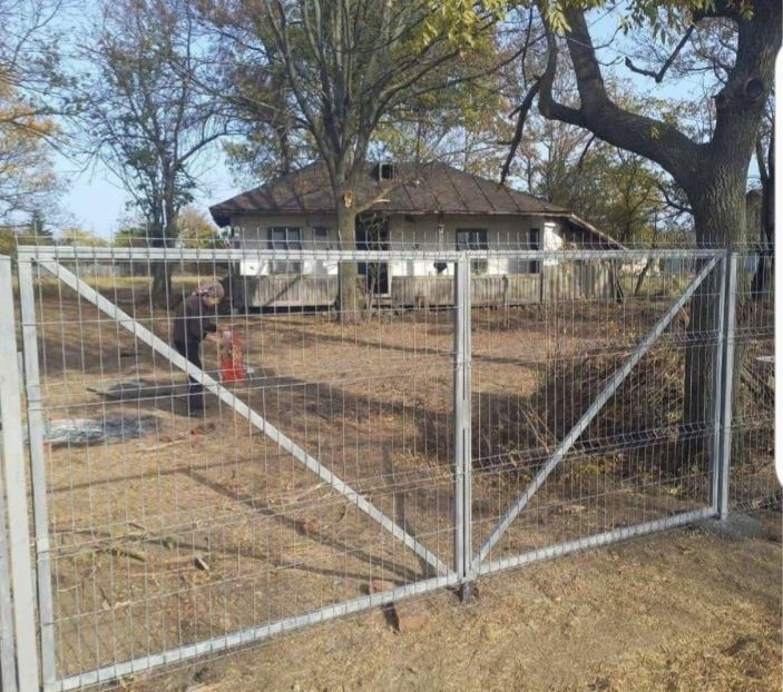 Executam garduri și porți inpresmuiri terenuri