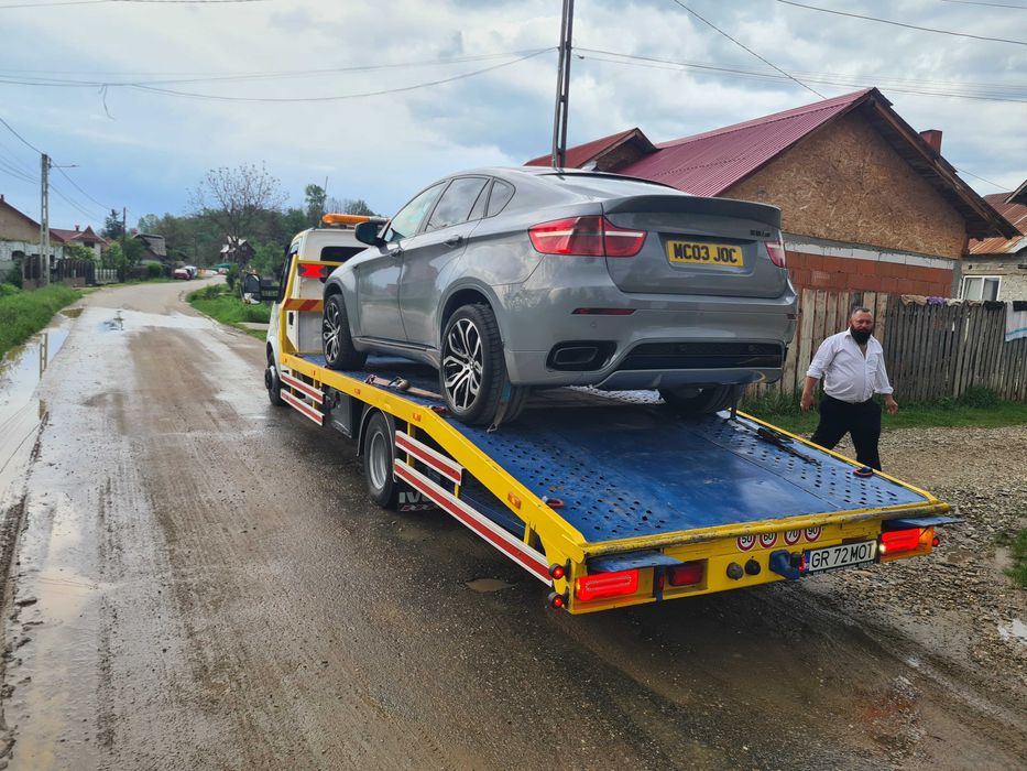 Tractari auto Transport utilaje tractor u650