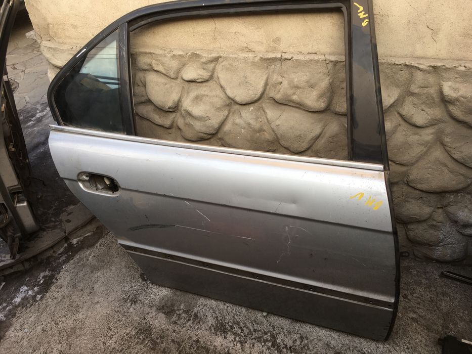 Двери на BMW e38 Long