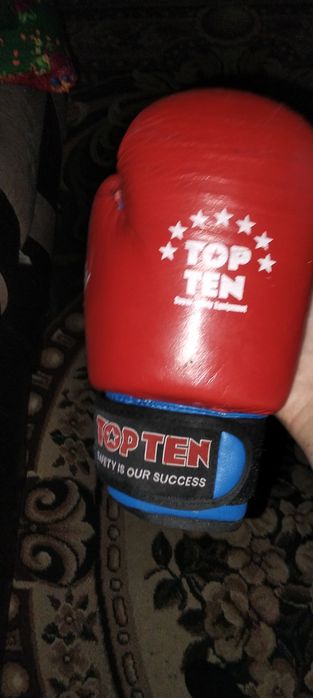 Топ Тен перчатки с потпесю Серика Сапиева