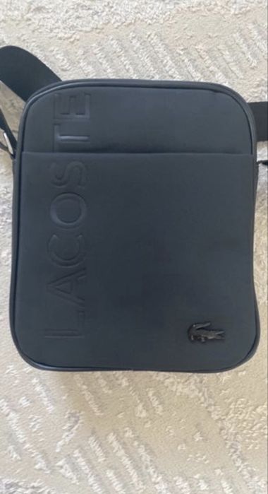 Продам барсетку лакосте, носил 4 дня