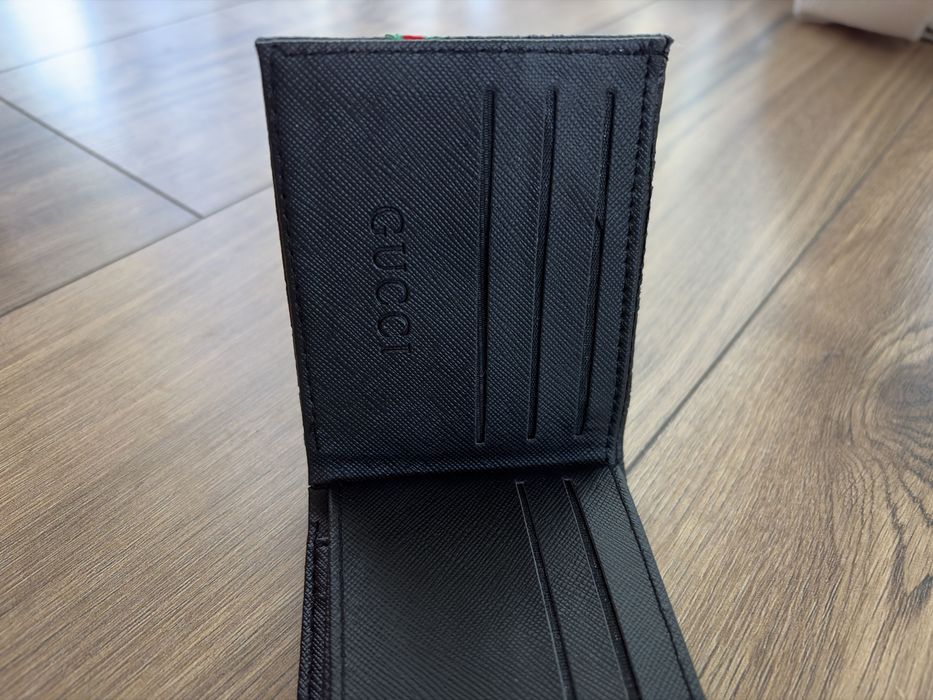 Gucci wallet with red strip