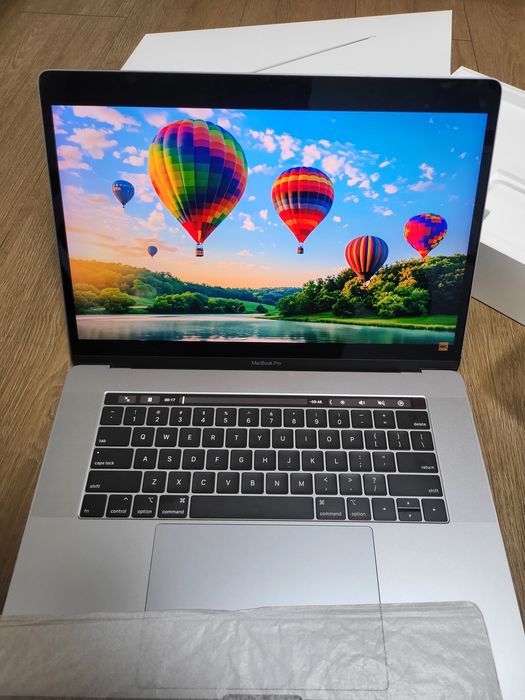 Macbook pro karobka hujati bilan