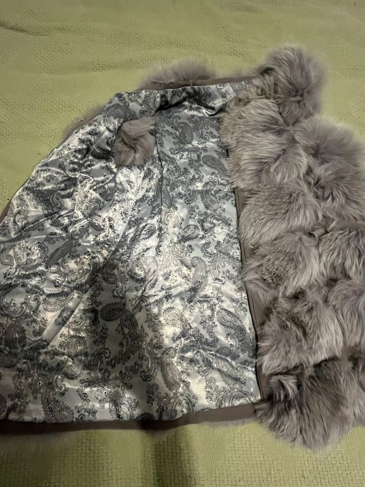 Продам меховую жилетку
