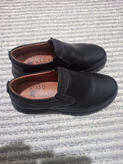 Продам новые туфли