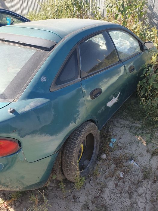 Продам  мазда 323
