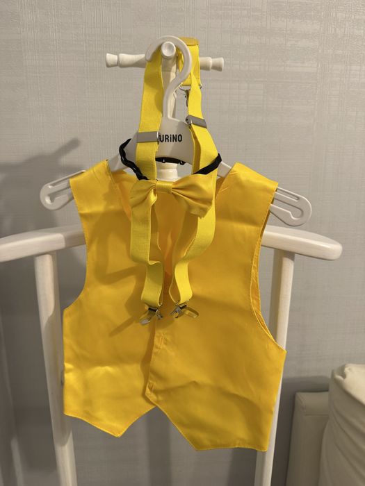 Продам жилетку желтого цвета