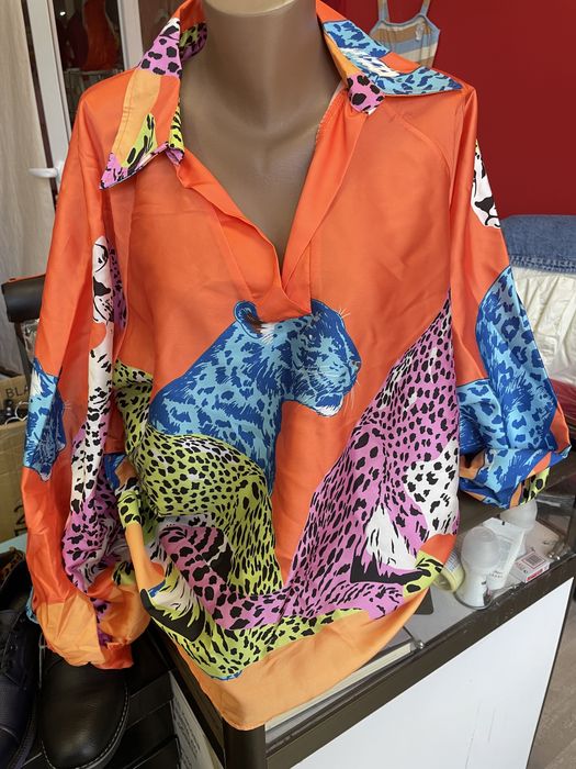 Универсален размер ризи