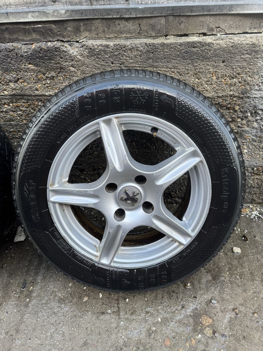 Jante gama Peugeot 185/65/15 cu anvelope de iarna