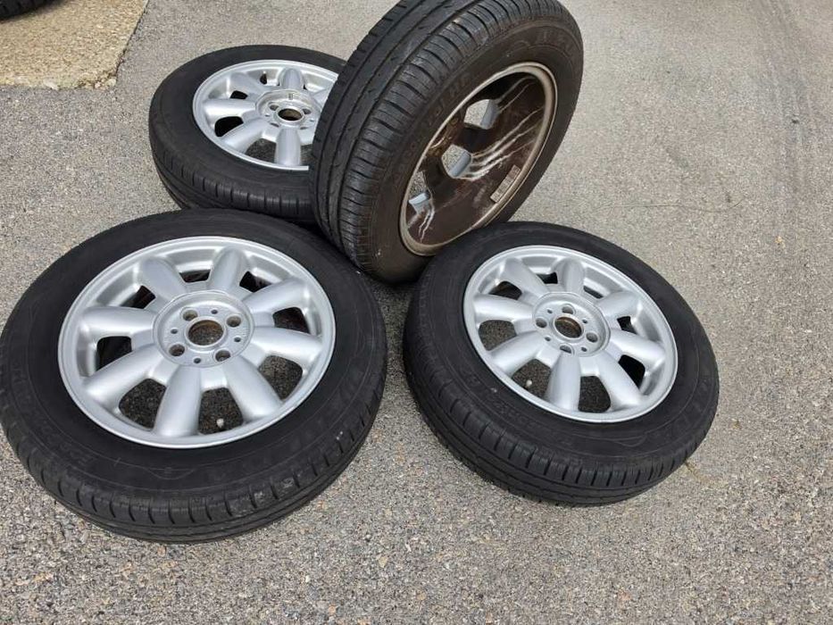 4 бр. Летни гуми 175/65 R15 с алуминиеви джанти 4x100 Mini