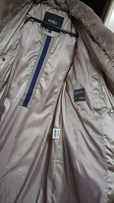 Продам пуховик зимний размер 52