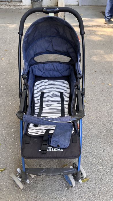Продам прогулочную коляску Skilmax