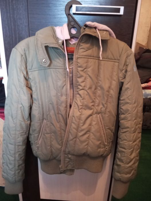 Куртки женские...