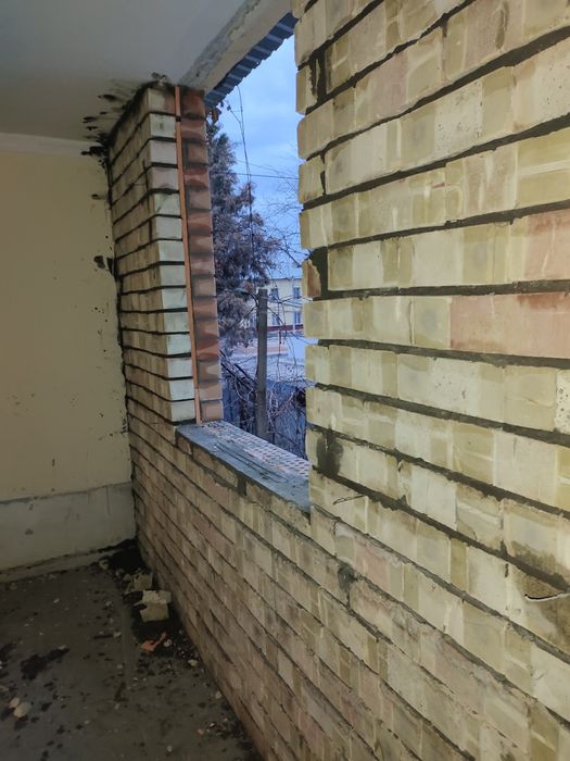 Кладка кирпича балкон