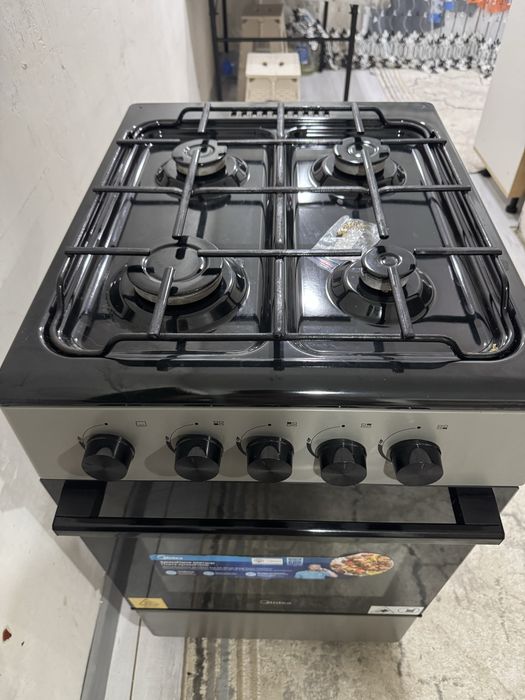 Продам газовую плиту Midea
