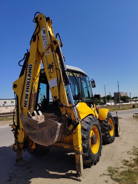 New Holland 115 Pagruzchik