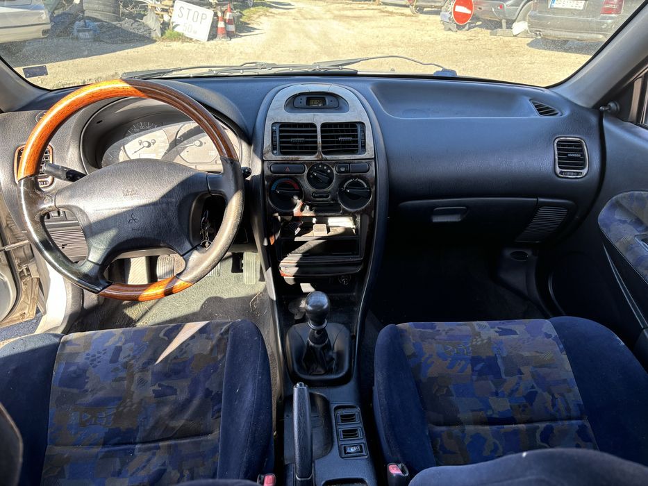 Мицубиши каризма 1.6 бензин на части.