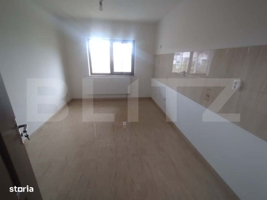 Casa de 140 mp, pe 2 nivele, 4 camere, oras Beclean