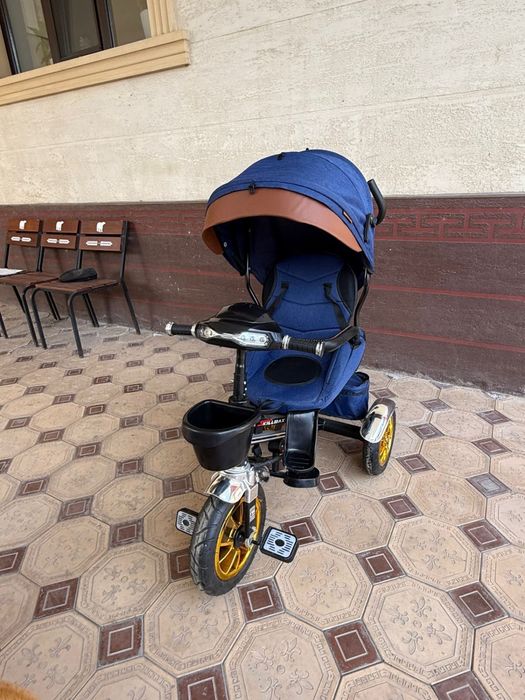 Продам трехколяску новый