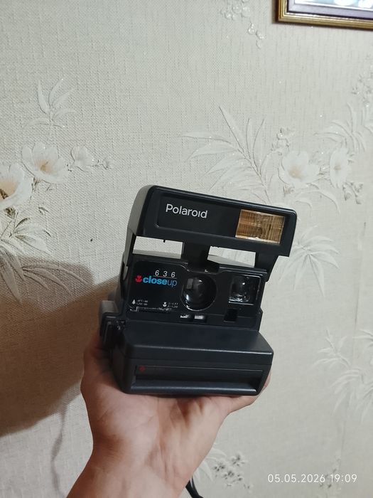 Фотоаппарат Полароид .