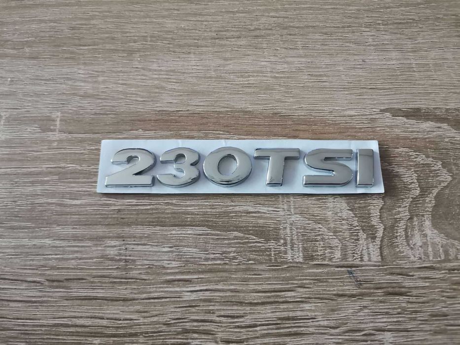 сребриста емблема Volkswagen 230 TSI малък размер