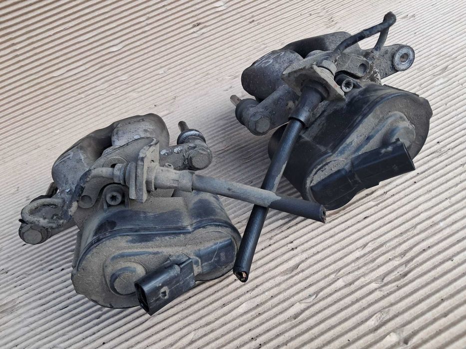 Vw Passat B6, set etrieri spate originali, modelul cu motoras