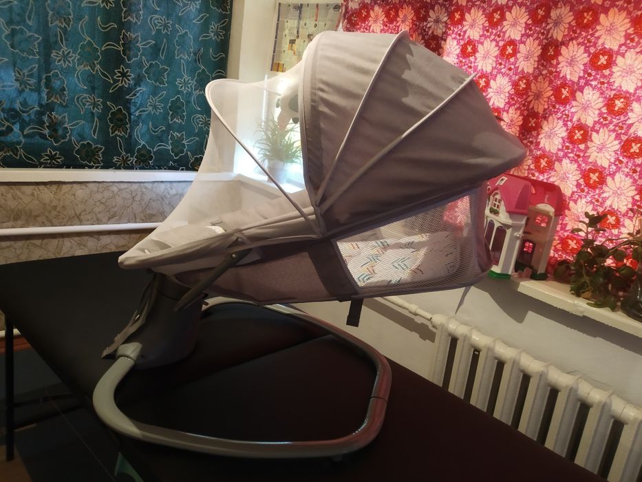 Укачивающий шезлонг