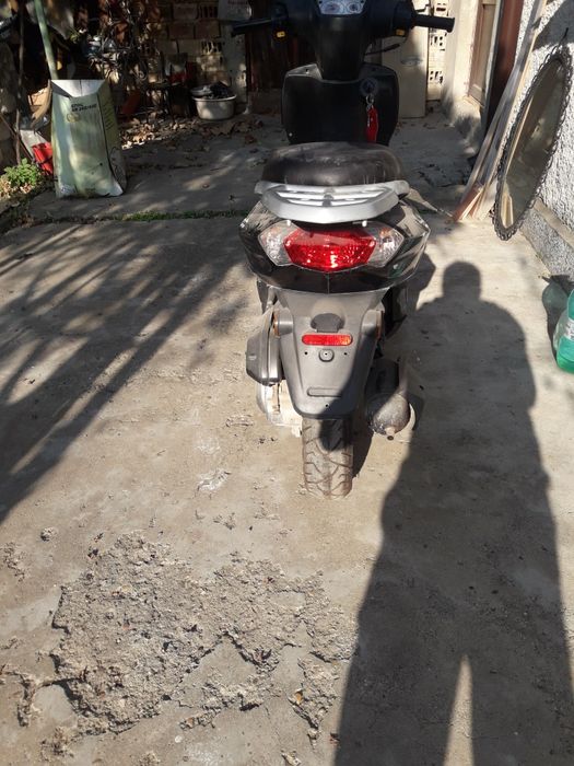 Мотопед Пежо кисби 50