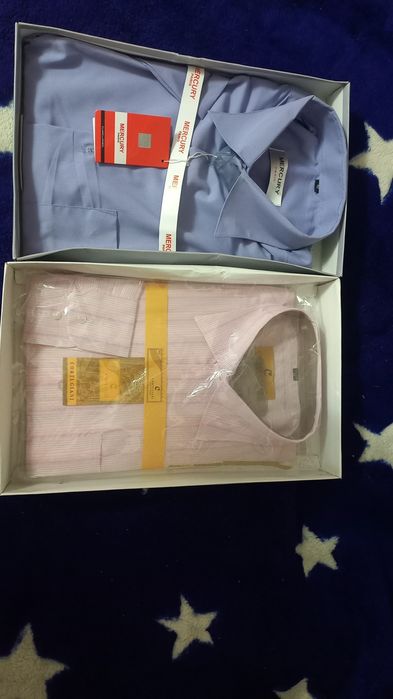 Рубашки мужские новые