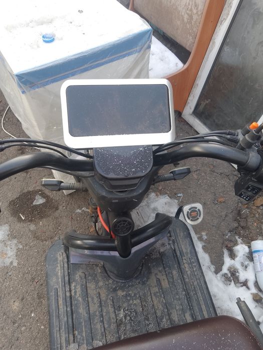 Электроцикл грузопосожирский.