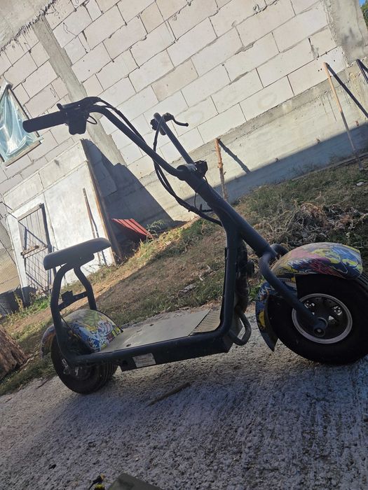 Moped electric folosit putin