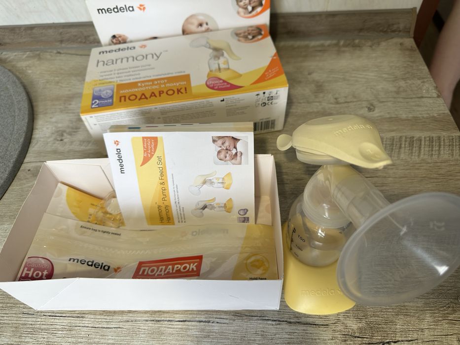 Молокоотсос механический