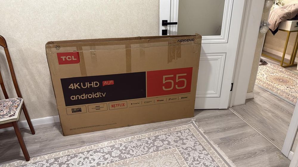 Телевизор TCl серого цвета