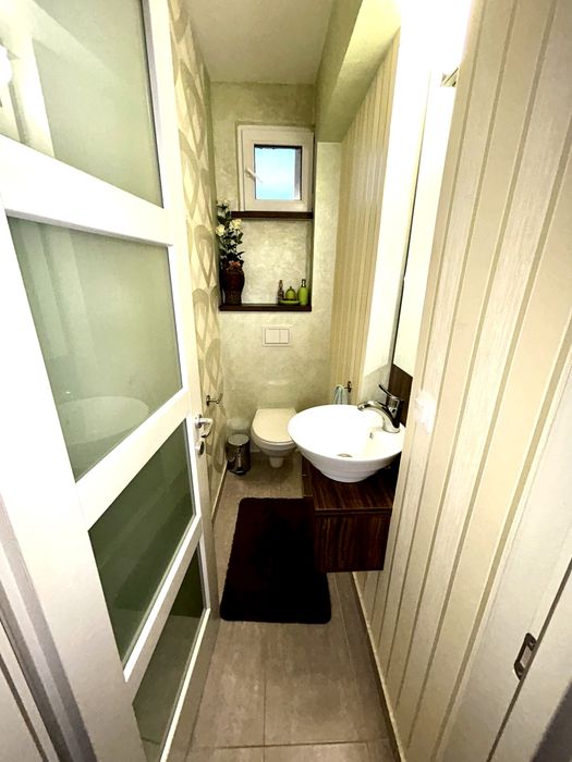 Apartament de inchiriat 4 camere,110 mp, garaj inclus, complet mobilat