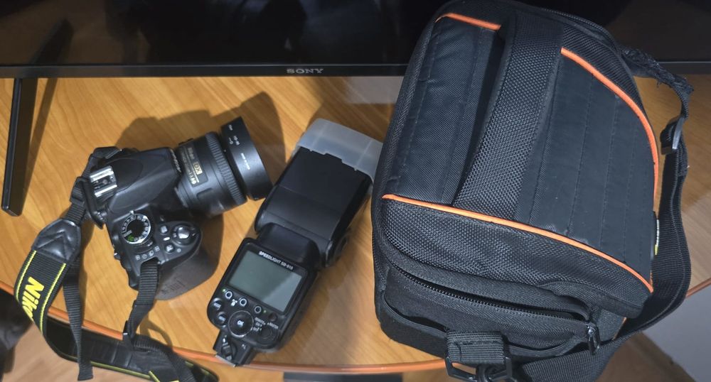 Ap foto Nikon d3100 + blitz sb 910
