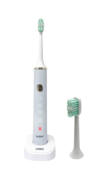 Электрическая зубная щетка