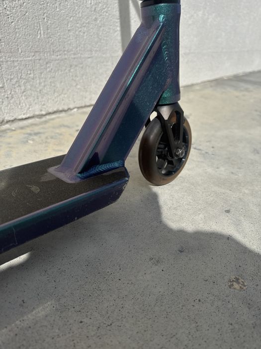 Trotinata freestyle whip Champ