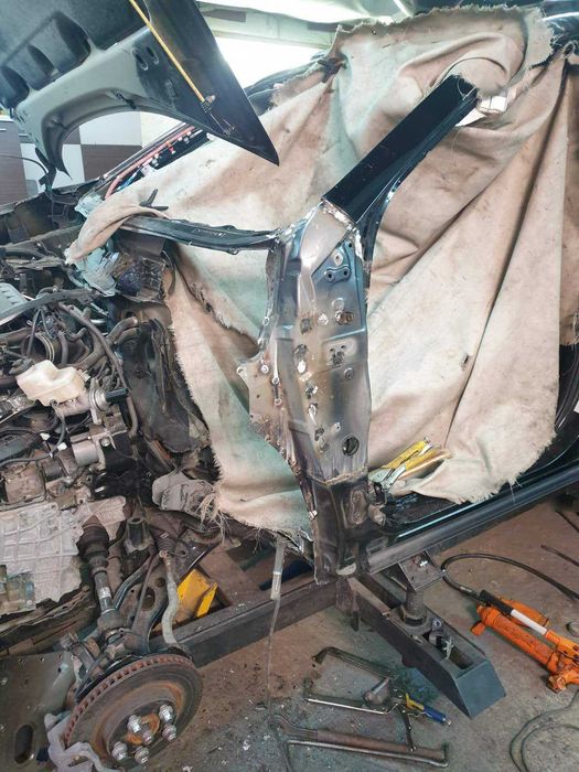 Дозер  с греда за разпъване на катастрофирали автомобили