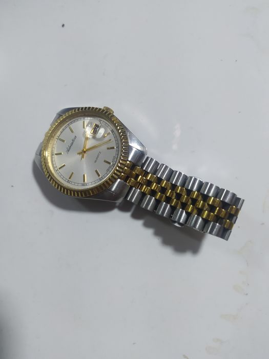 Часы швейцарские золотые