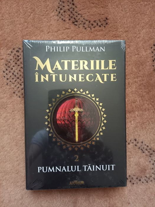 Trilogie cărți materiile întunecate de Phillip Pullman