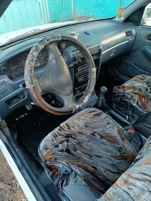 Автомобиль киа сепия