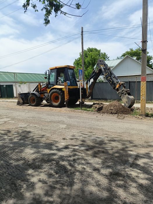 Услуги экскаватора погрузчика