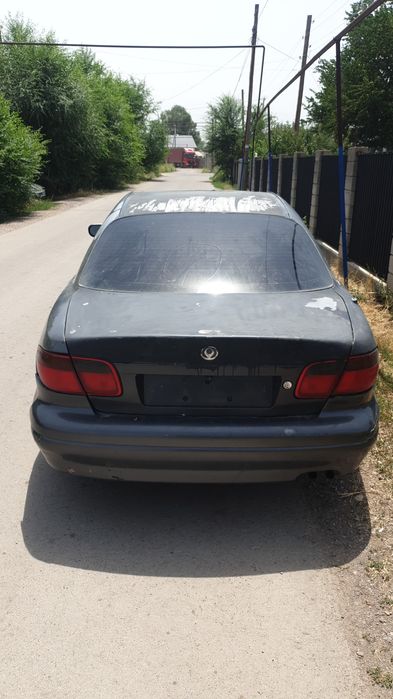 Продам мазда кседос 9