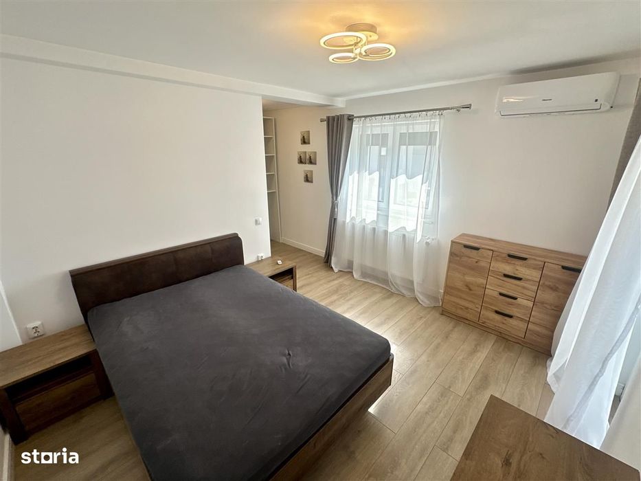 Casa moderna cu 2 dormitoare, 2 bai, terasa si dotari SMART